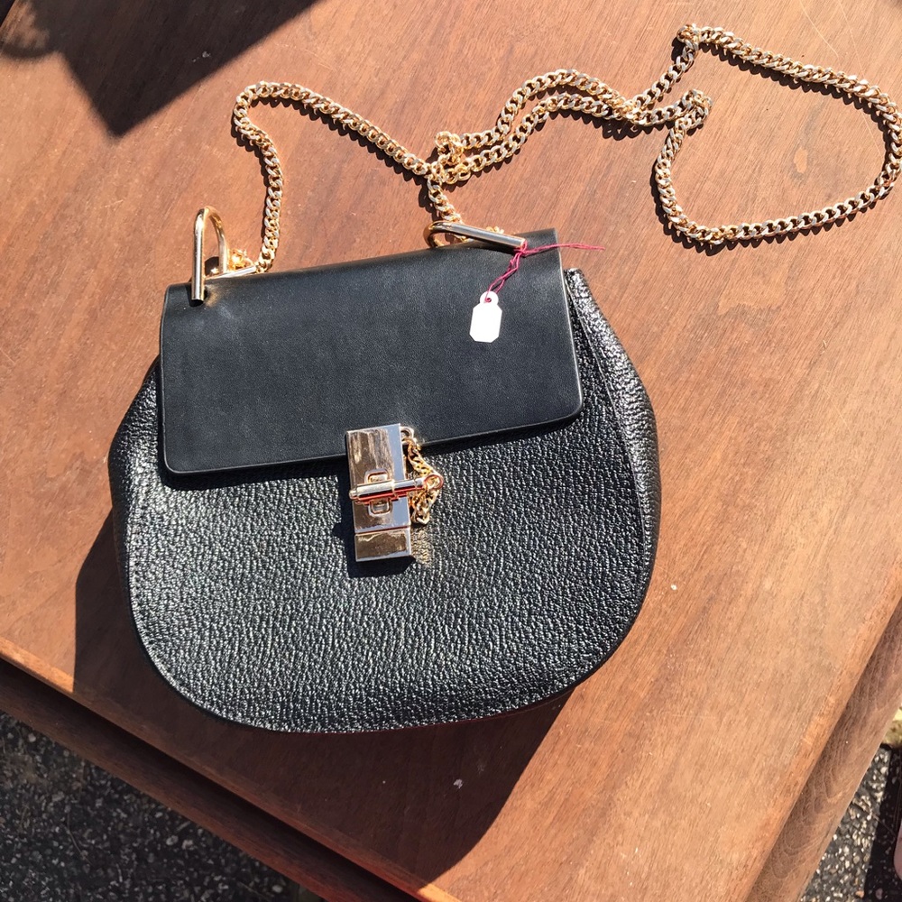 Black and gold tone purse